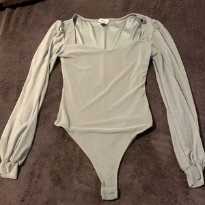 Selling this sliver/green body suit. Worn it once and does not fit me:(